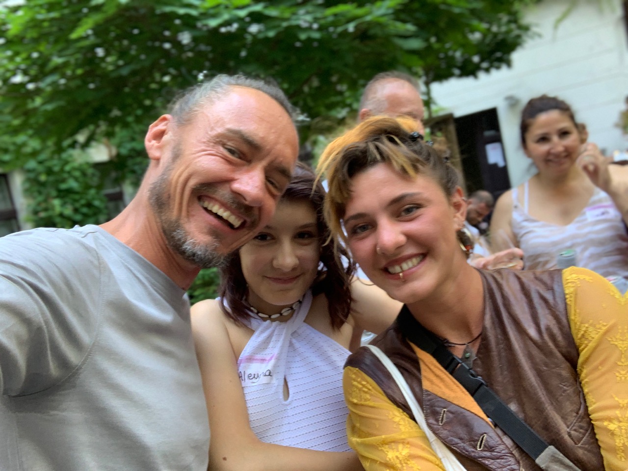 Candid moment of guests interacting at the 13th mtc summer party